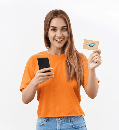 social tap - bamboo business card in the hands of a girl