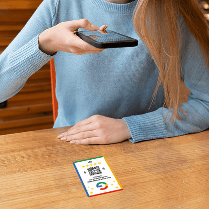 person scanning google review card